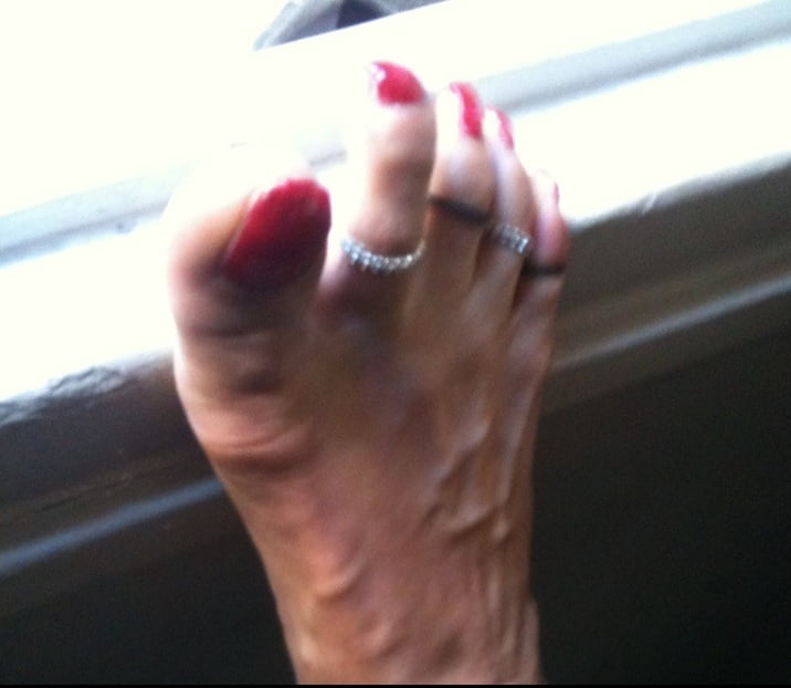 red toenails mix (older, dirty, toe ring, sandals mixed). #106916394