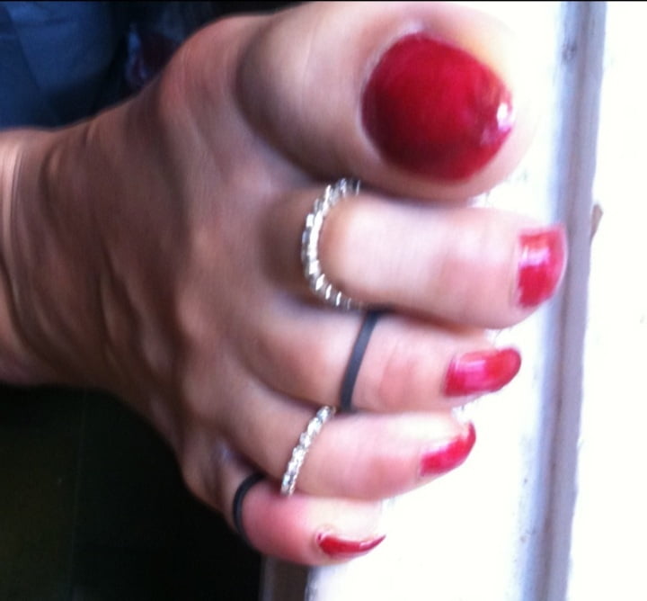 red toenails mix (older, dirty, toe ring, sandals mixed). #106916397