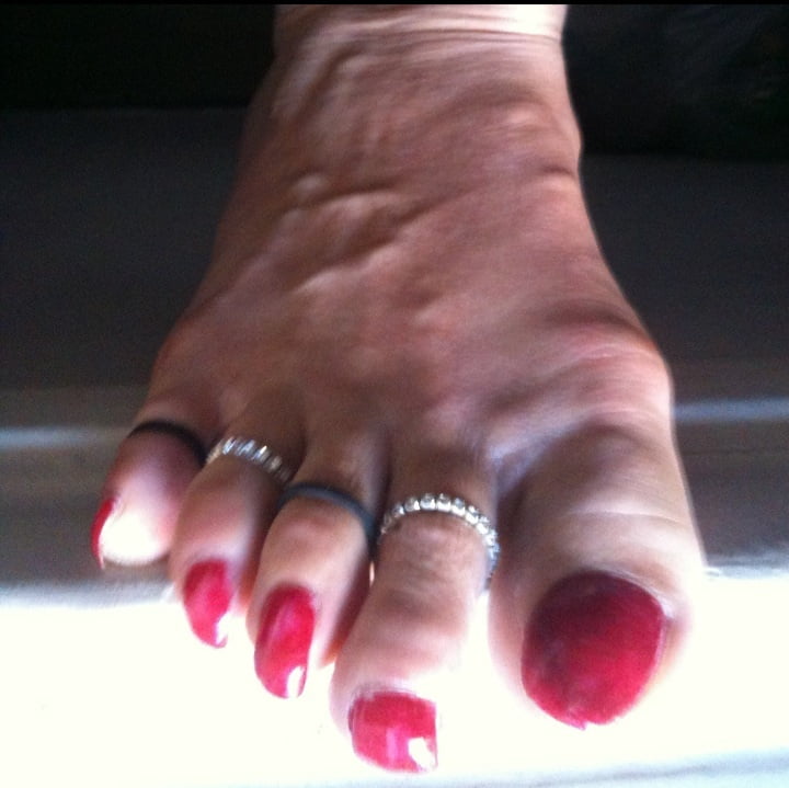 red toenails mix (older, dirty, toe ring, sandals mixed). #106916405