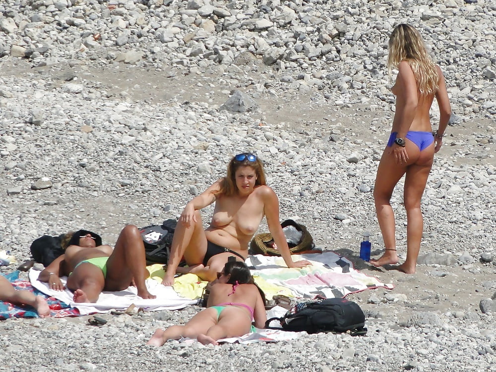 Girls Changing on the Beach for Topless Lovers #105107704