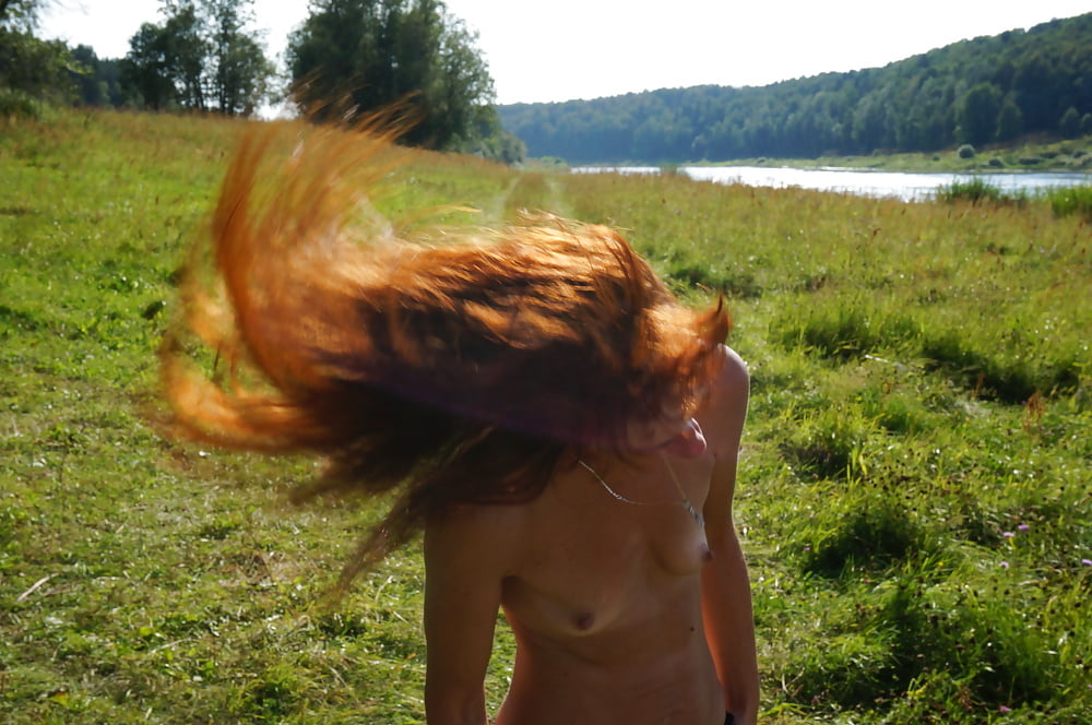 Redhair on Volga-river beach #107252969