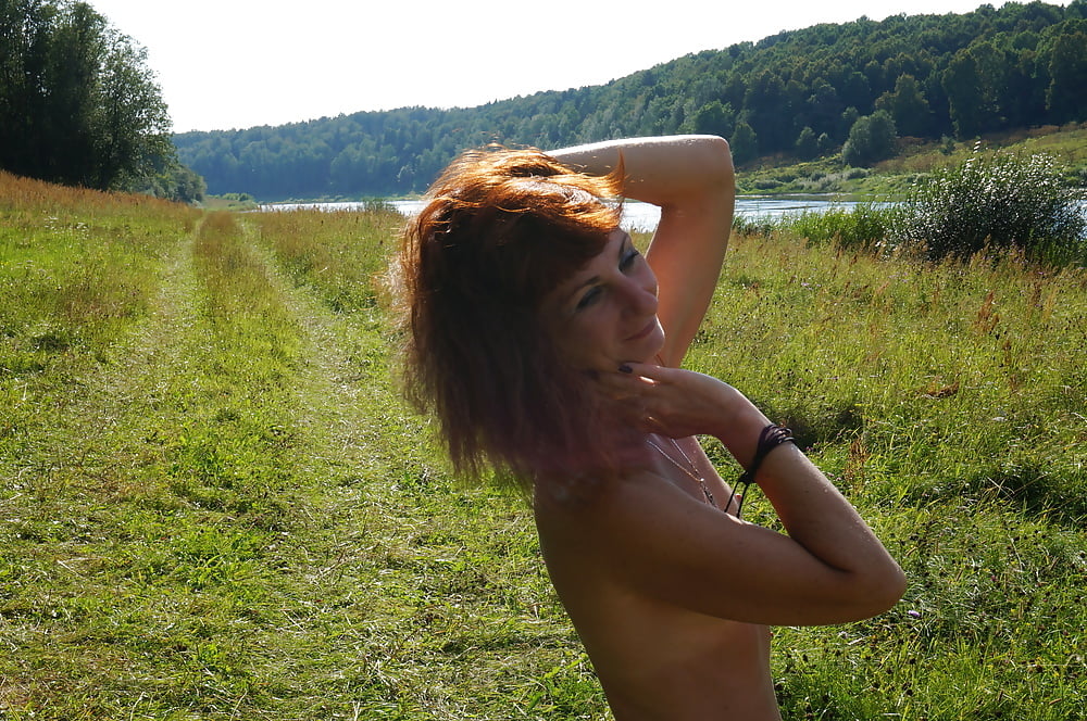 Redhair on Volga-river beach #107252972