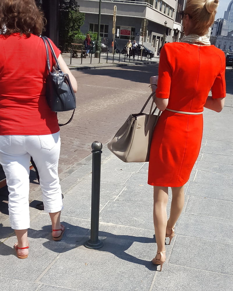 blonde in red dress and tan pantyhose #102352627