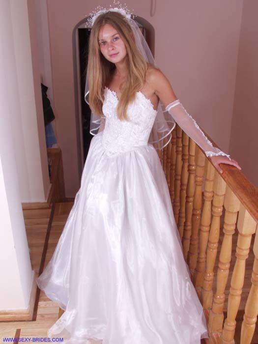 Sexy Bride Wearing White Dress #90480666