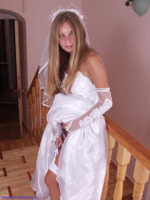 Sexy Bride Wearing White Dress #90480669