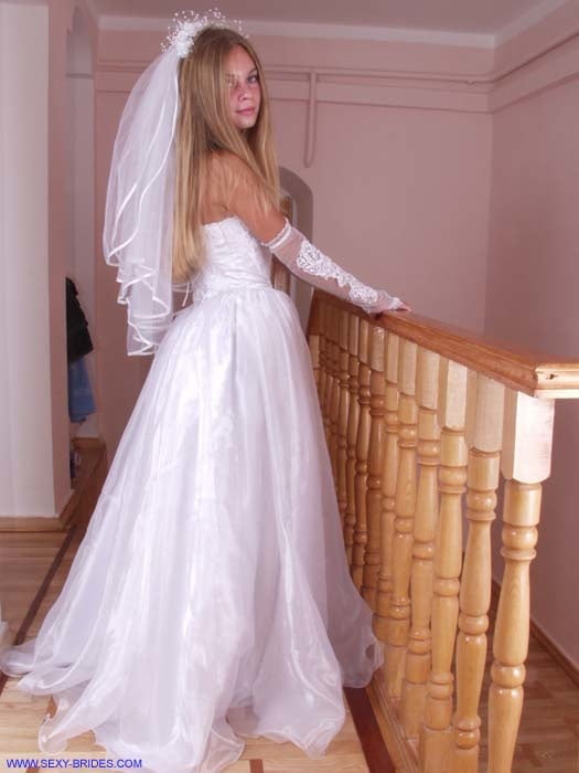 Sexy Bride Wearing White Dress #90480740