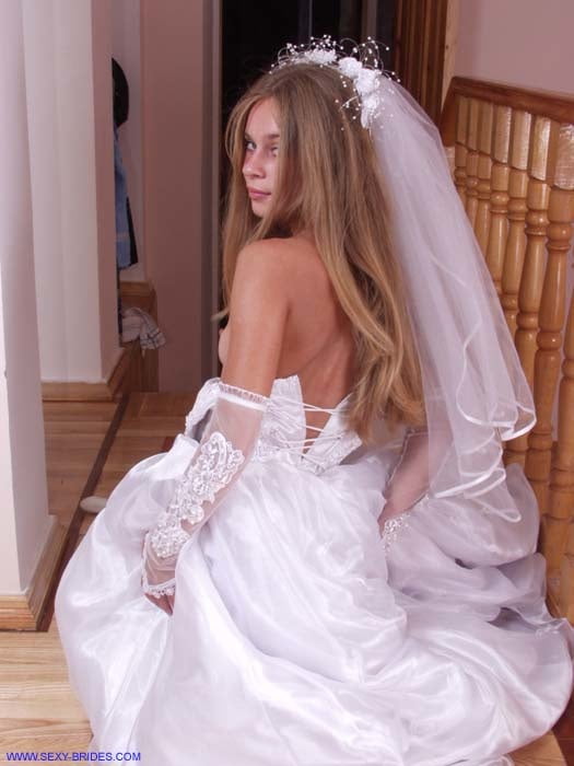 Sexy Bride Wearing White Dress #90480787