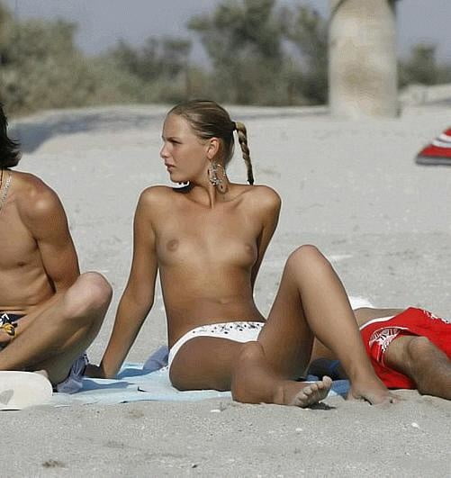 Topless on the beach single
 #104570315