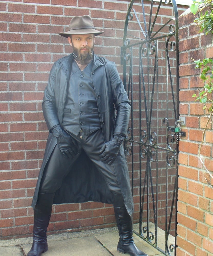 Leather Master outdoors in leather coat and boots #107165852