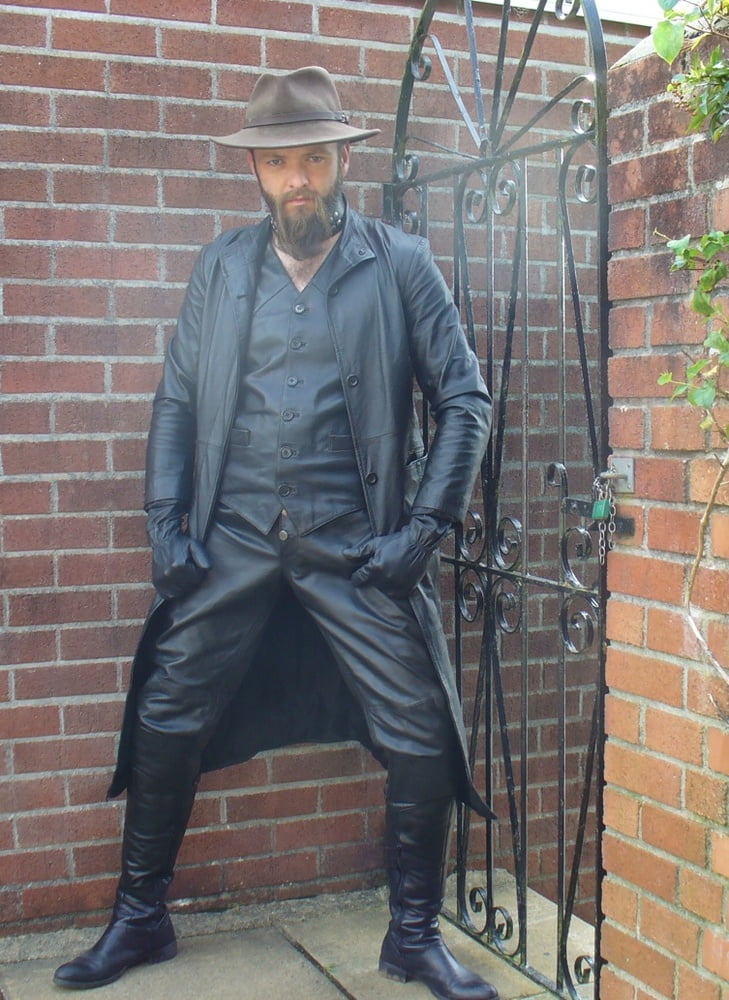 Leather Master outdoors in leather coat and boots #107165854