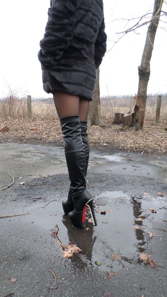 Black Boots, Tights and Fur Coat #95842776