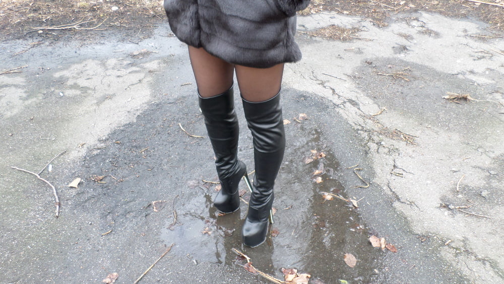 Black Boots, Tights and Fur Coat #95842780