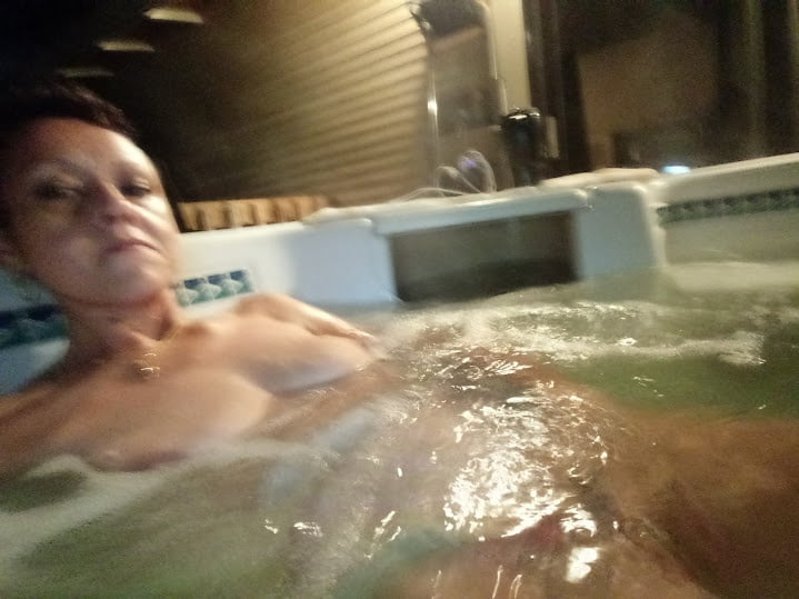 Nighttime hot tub fun #106796782