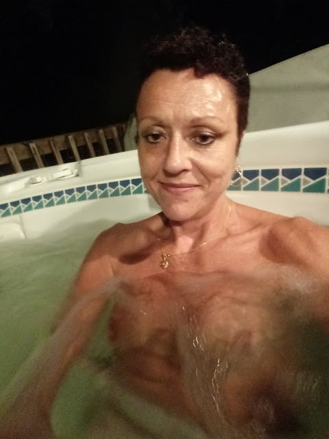 Nighttime hot tub fun #106796789
