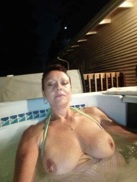 Nighttime hot tub fun #106796791