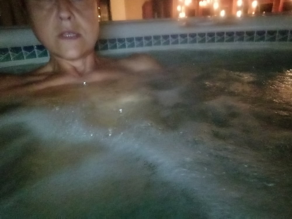 Nighttime hot tub fun #106796795