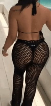 Sexy woman in black thong and mesh pants #93079892