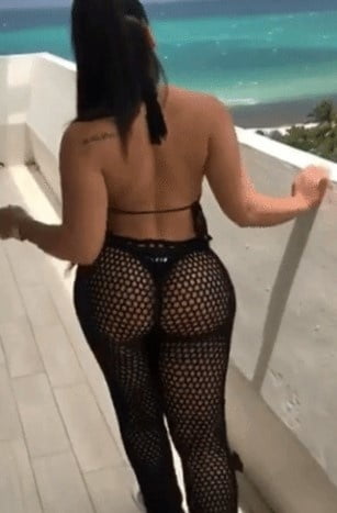 Sexy woman in black thong and mesh pants #93079902