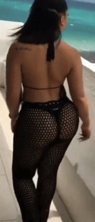 Sexy woman in black thong and mesh pants #93079925