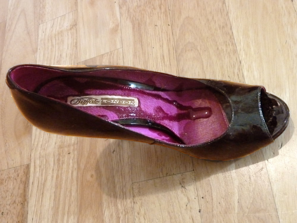 wife's purple Buffalo heels #106888516
