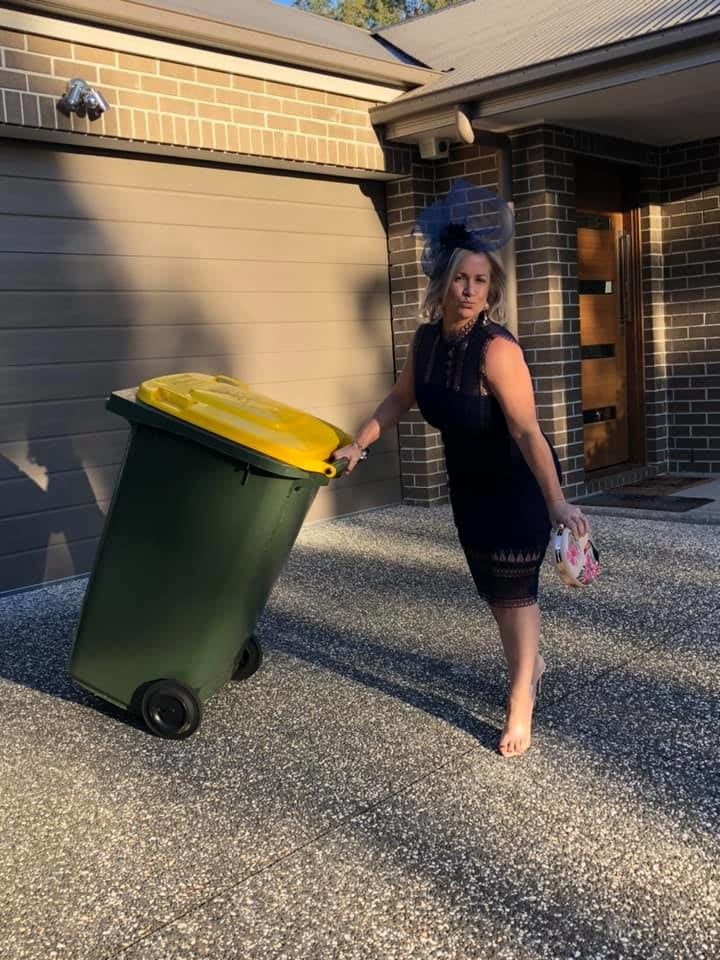 DRESSED UP TAKING TRASH OUT #95488440