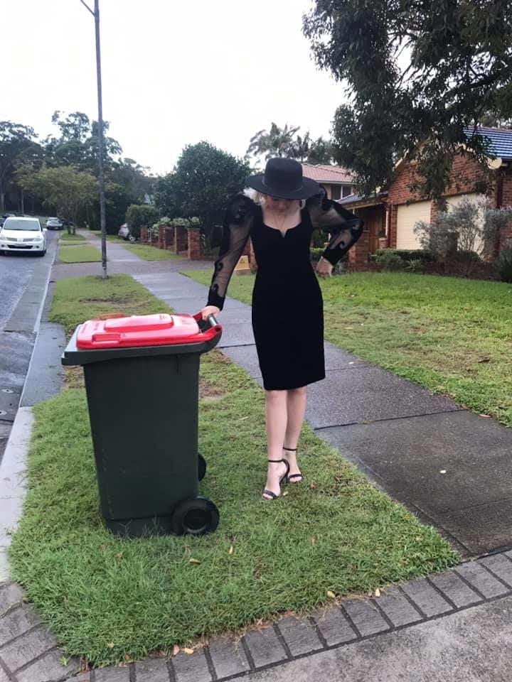 DRESSED UP TAKING TRASH OUT #95488446