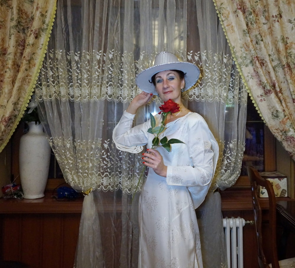 In Wedding Dress and White Hat #107138402