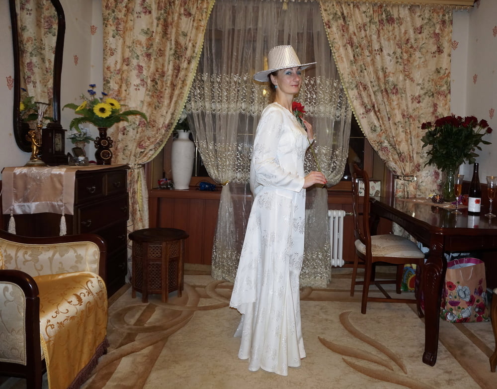 In Wedding Dress and White Hat #107138449