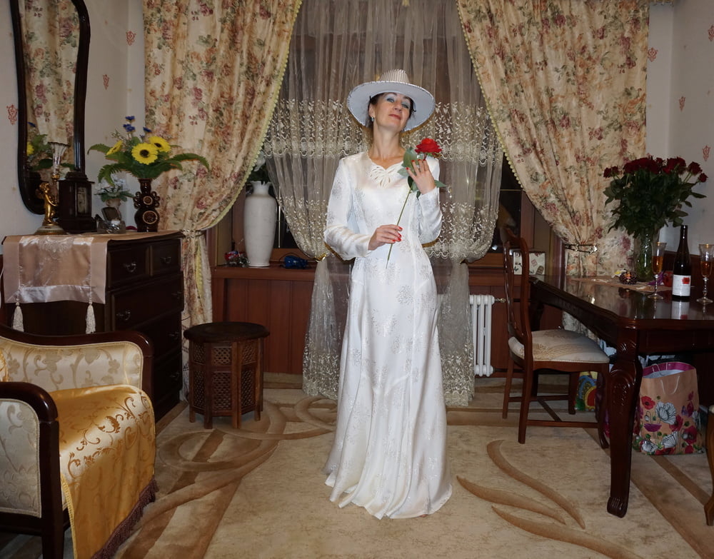 In Wedding Dress and White Hat #107138450
