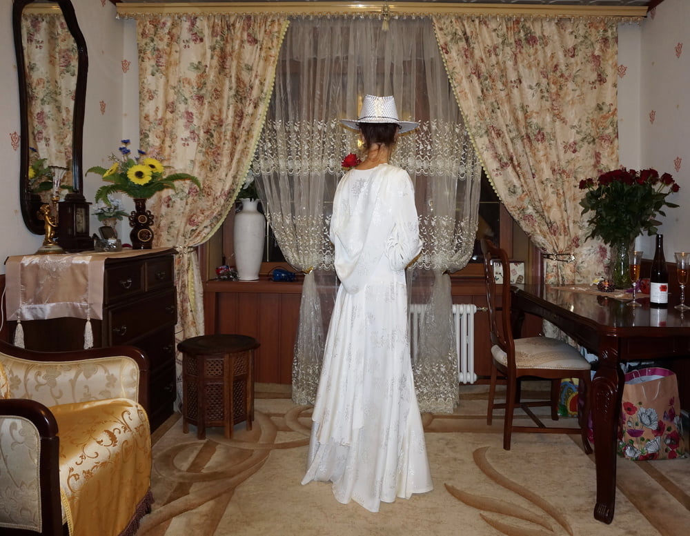 In Wedding Dress and White Hat #107138452