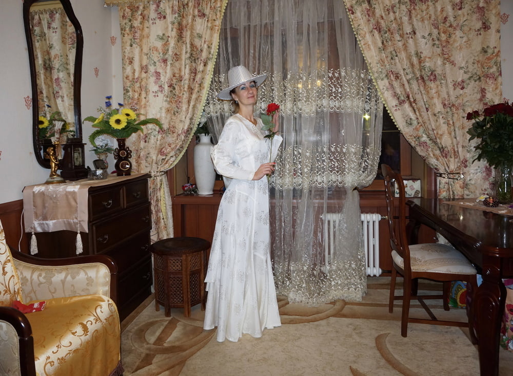 In Wedding Dress and White Hat #107138455
