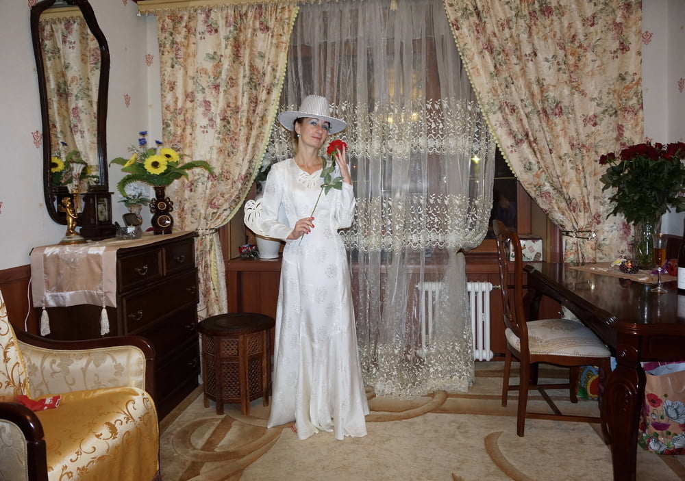 In Wedding Dress and White Hat #107138456