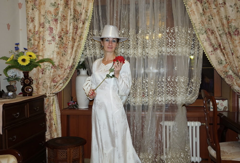 In Wedding Dress and White Hat #107138457