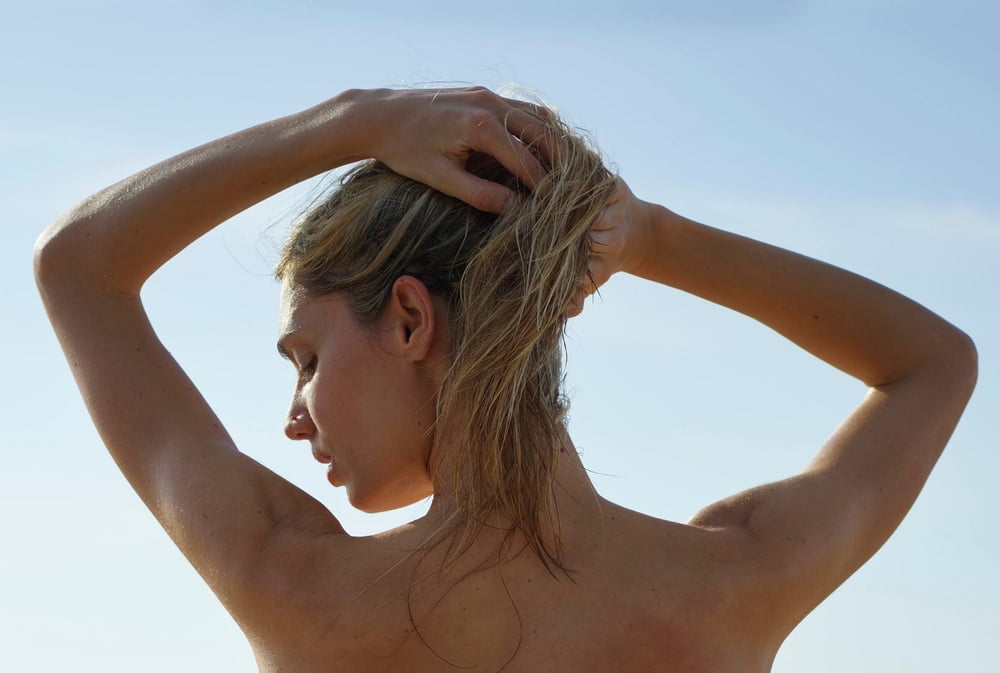 A naturist girl photographed #81259584
