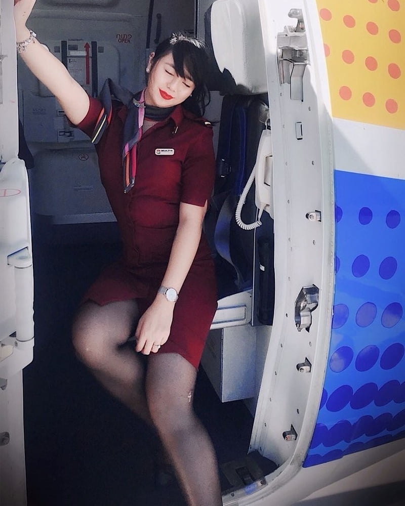 Hostess dell'aria - assistente di volo - personale di cabina - hostess
 #93943616