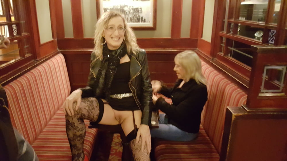 Lisa and Pauline in Handcuffs in the pub with Mike and John #106850458