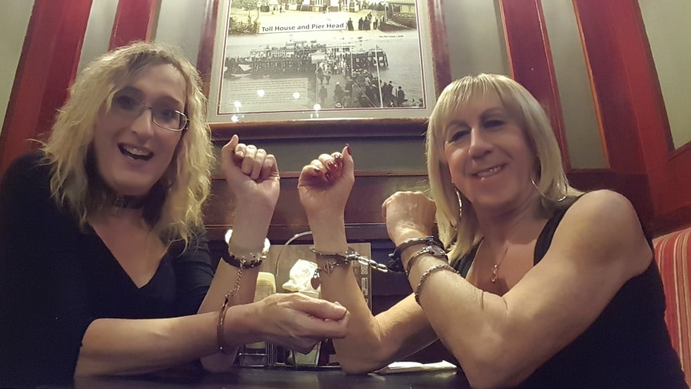 Lisa and Pauline in Handcuffs in the pub with Mike and John #106850494