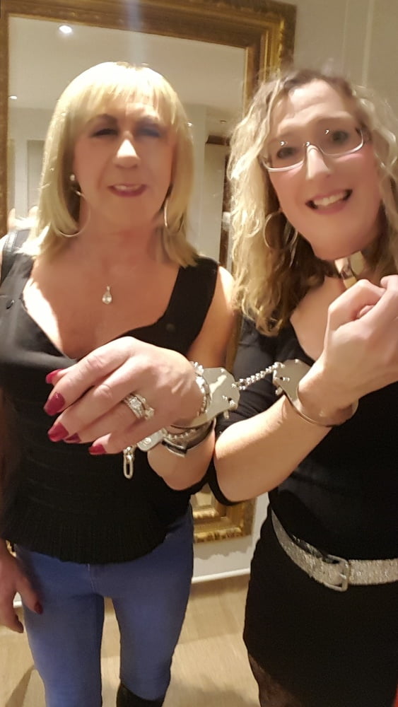Lisa and Pauline in Handcuffs in the pub with Mike and John #106850520
