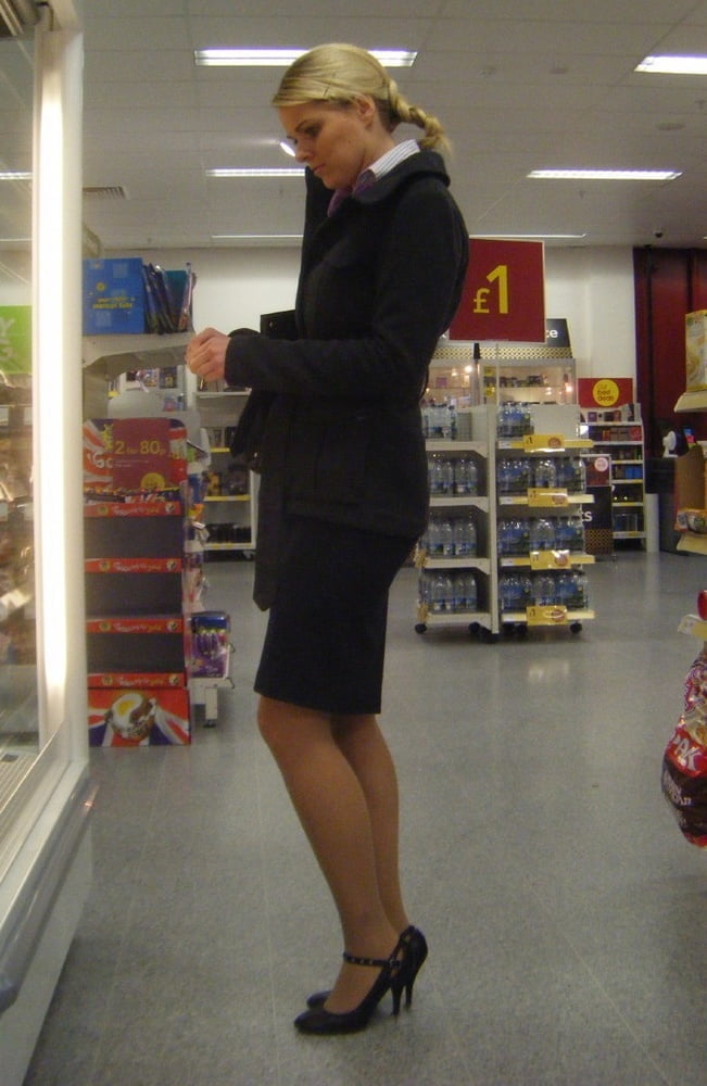 Pretty secretary in supermarket #93643711