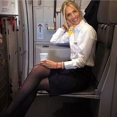 Sexy Stewardess in Fersen und Strümpfen 2
 #87936903