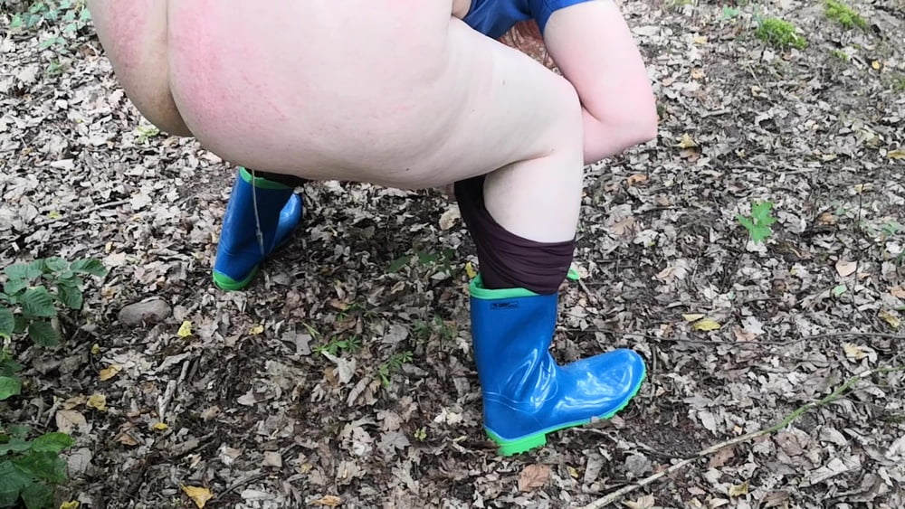 Peeing in rubber boots #106826602