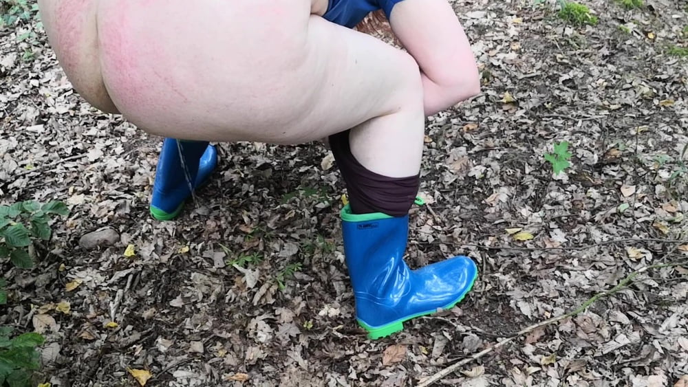 Peeing in rubber boots #106826614