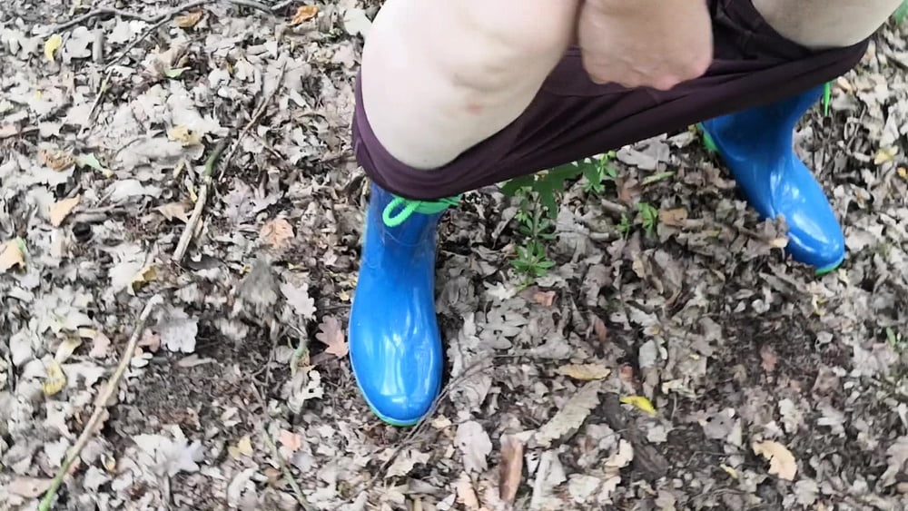 Peeing in rubber boots #106826619