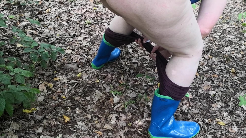 Peeing in rubber boots #106826632