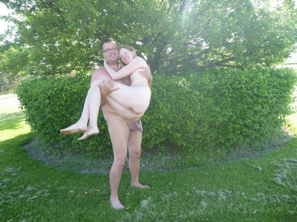 Happy nudist couple #105586970