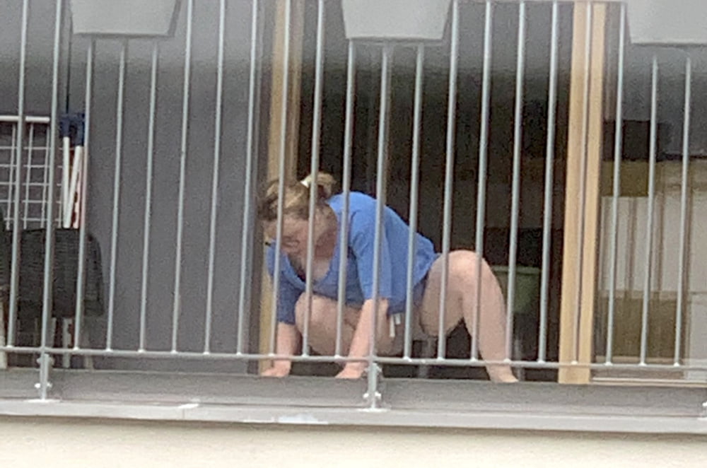 Chubby Neighbour on balcony #94532900