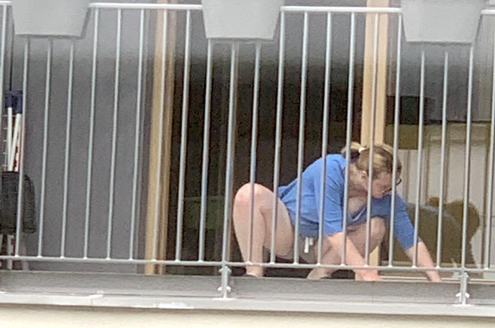 Chubby Neighbour on balcony #94532906