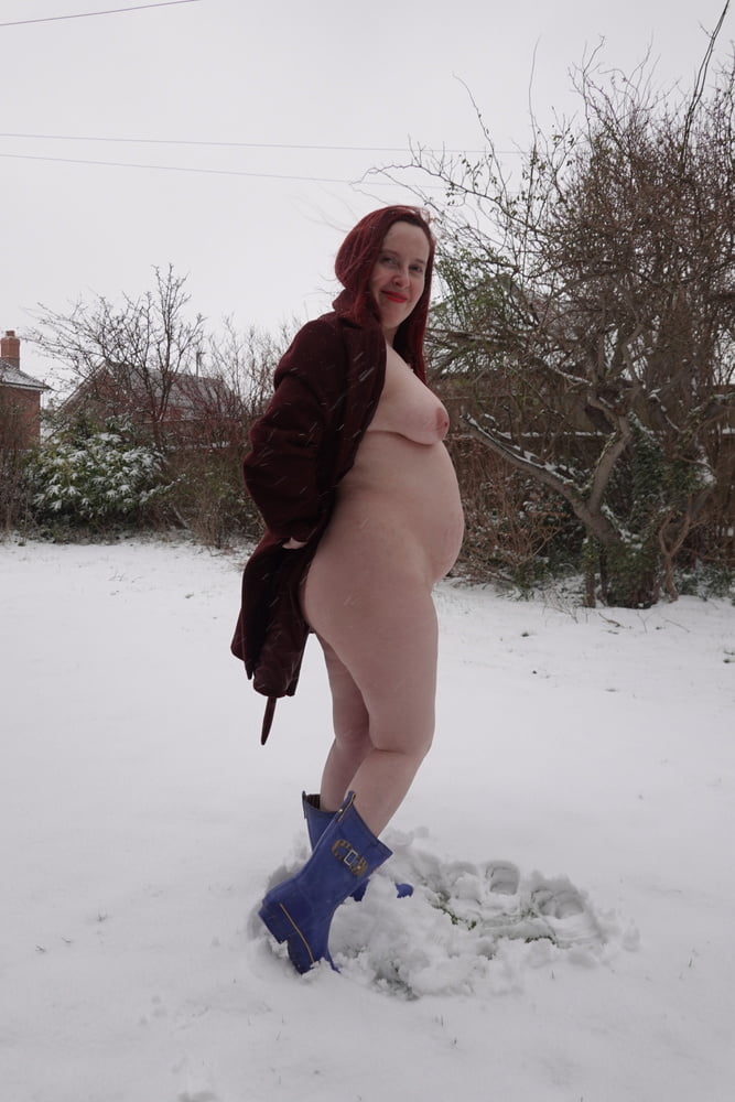 Pregnant flashing naked in the cold snow #106779822