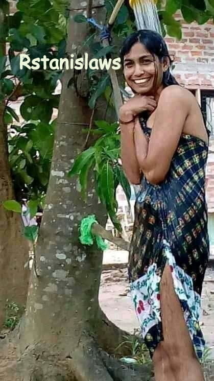 Sri lankan girls bathing outdoor
 #80867273