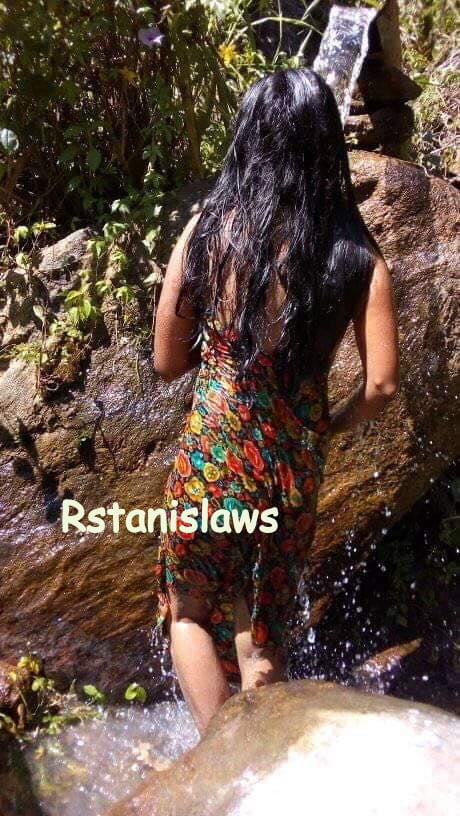 Sri lankan girls bathing outdoor
 #80867321